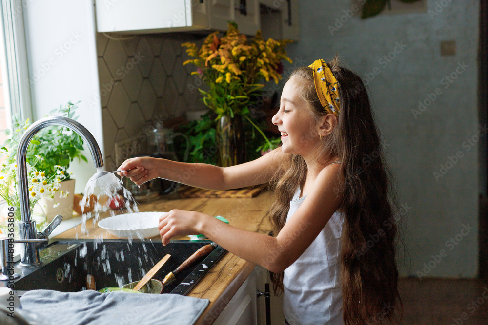 Girls, kids and washing dishes in kitchen, cleaning and learning ...