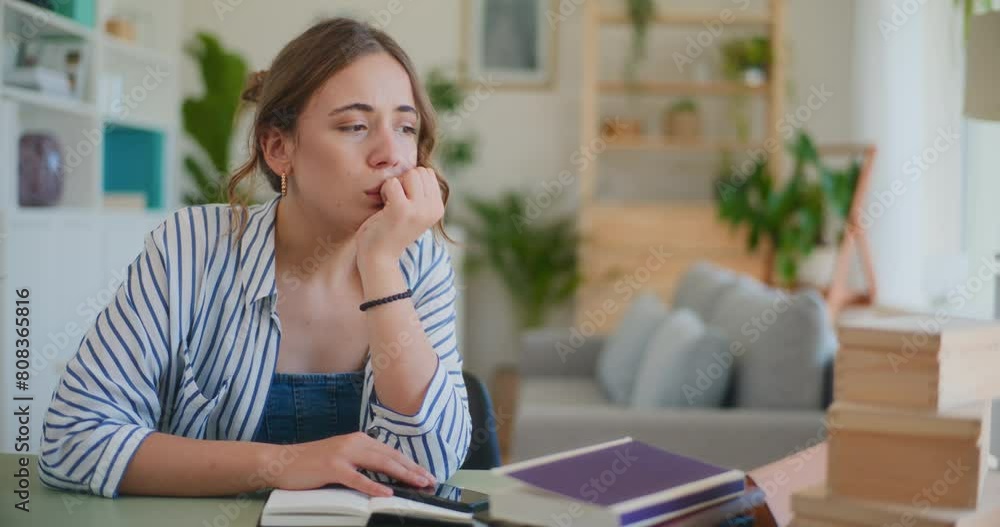 Sad Pensive Woman Sitting at Desk While Learning and Having Reflections Sad Pensive Woman Sitting at Desk While Learning and Having Reflections