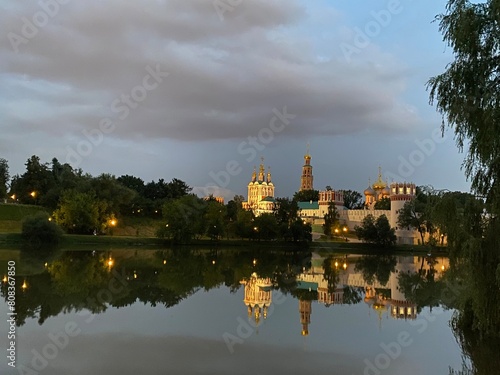 reflection of the monastery in the pond © Natalia