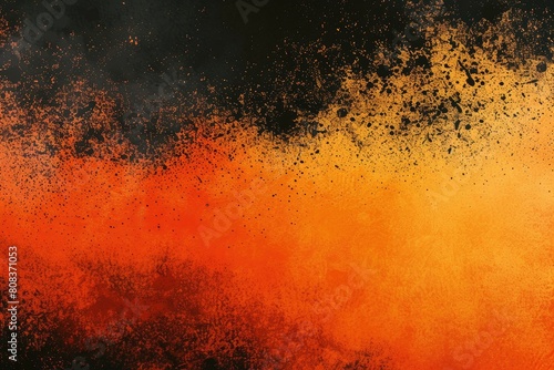 A black and orange background with a lot of splatter
