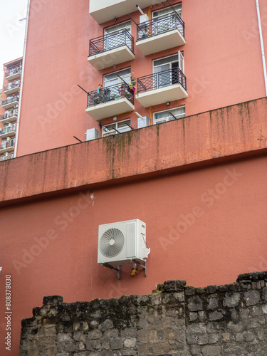 Air conditioning in the old town. Modern and old. Climate control.