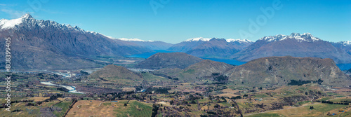 Panorama of Queenstown valley and Lake Wakatipu from the top of the alpine Crown Range road across the mountains photo