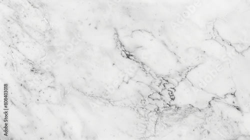 High-resolution image capturing the refined elegance of white marble texture with subtle grey veins, perfect for luxurious background or design elements in projects