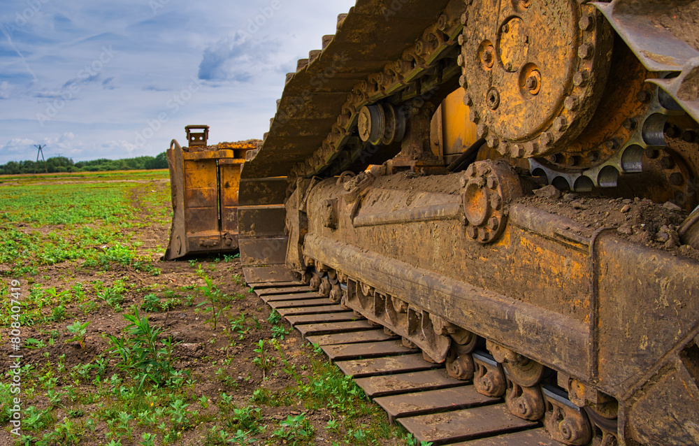 Φωτογραφία gear mechanism of the tracks of a construction bulldozer - close up