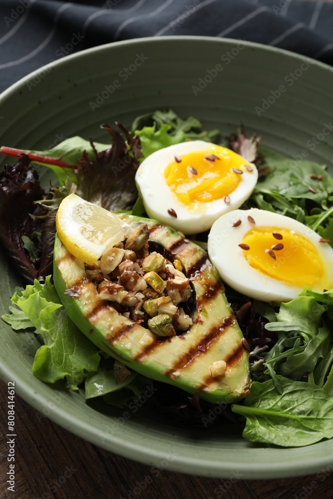 Healthy dish high in vegetable fats on table, closeup Healthy dish high in vegetable fats on table, closeup