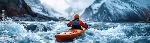 A kayaker skillfully maneuvering through turbulent river currents in a remote and untamed wilderness photo