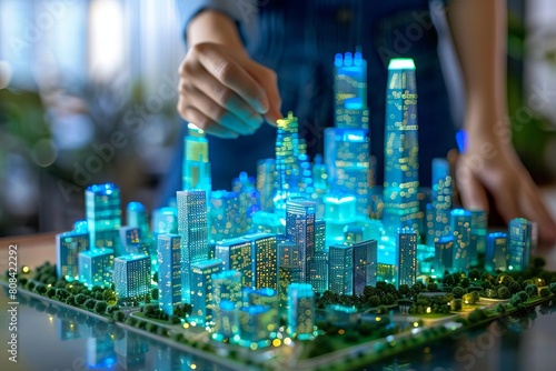Executive holding a digital twin of a city to analyze urban development photo