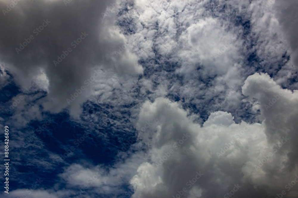 Obraz premium black and white clouds in a blue sky