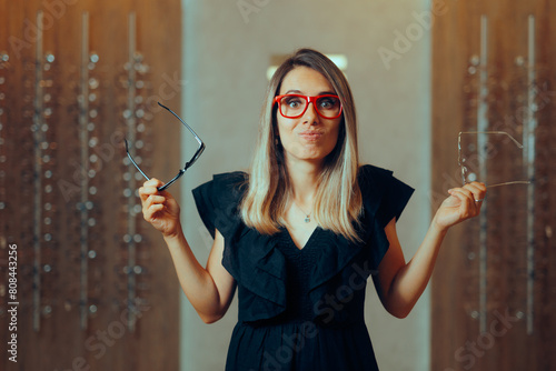 Obraz na plátně Undecided Woman Choosing a New Eyeglasses Frame