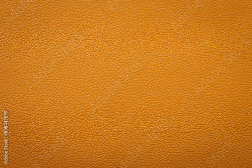 Synthetic leather brown background texture. Brown leather textured background.