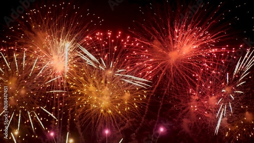 Red Firework celebrate anniversary happy new year 2024  4th of july holiday festival. red firework in night time celebrate national holiday. Countdown to new year 2025 festival party time event