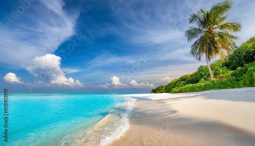 Beautiful sandy beach with white sand and rolling calm wave of turquoise ocean on Sunny day 
