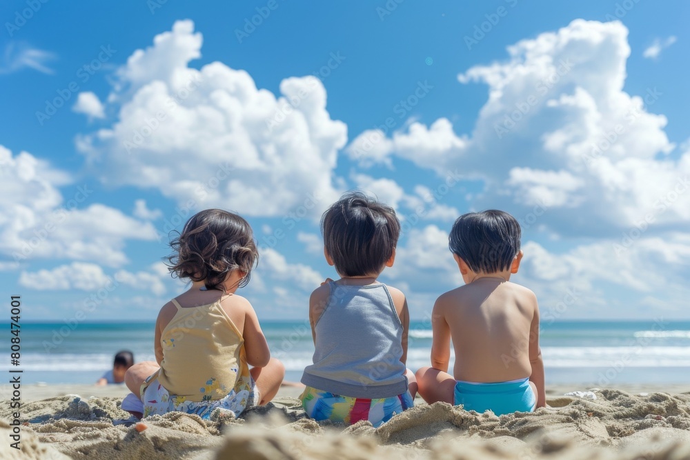 Φωτογραφία 海を見ている日本人の子供の後ろ姿（夏休み・海遊び・水遊び）