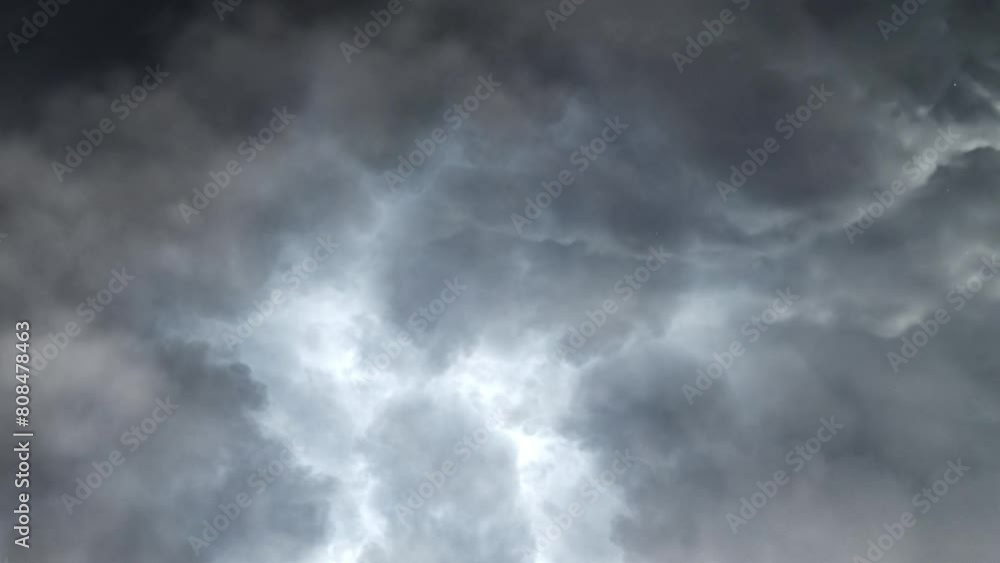 lightning strikes during a storm in dark cumulonimbus clouds lightning strikes during a storm in dark cumulonimbus clouds