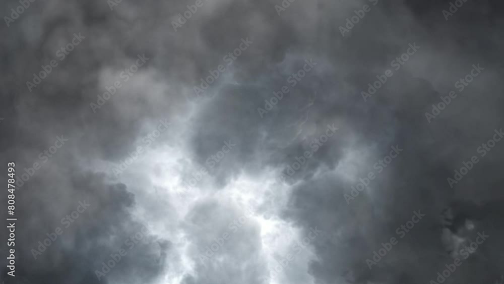 The view enters a cloudy gray cloud filled with lightning strikes The view enters a cloudy gray cloud filled with lightning strikes