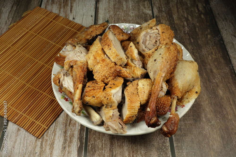Pile of steamed or boiled duck serving on the plate. Famous classic menu in Asian restaurant. Pile of steamed or boiled duck serving on the plate. Famous classic menu in Asian restaurant.