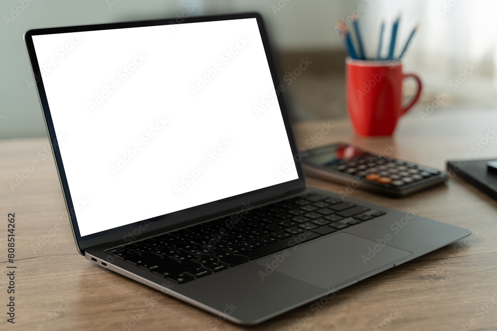 Laptop with blank screen on table. Workspace background new project on laptop computer with blank copy space screen for your advertising text message Laptop with blank screen on table. Workspace background new project on laptop computer with blank copy space screen for your advertising text message