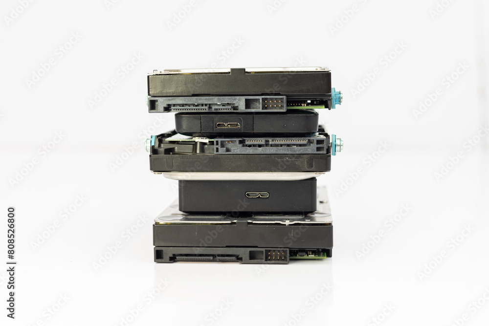 Hard disc drives stacked isolated on white background with copy space Hard disc drives stacked isolated on white background with copy space