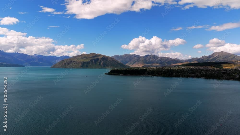 Aerial perspective captured by a drone showcasing the iconic Lake Wānaka, south Island of New Zealand Aerial perspective captured by a drone showcasing the iconic Lake Wānaka, south Island of New Zealand
