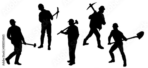 Silhouette group of male workers with their tools. Silhouette of workers with sledge hammer, pick axe and shovel tools.