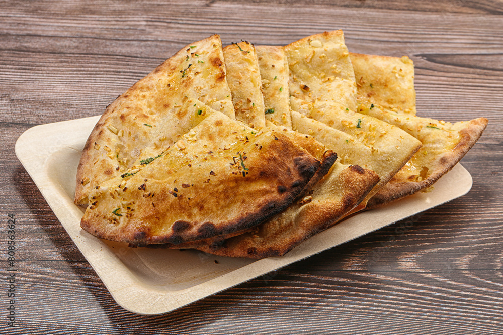 Indian tandoori bread - Garlic naan Indian tandoori bread - Garlic naan