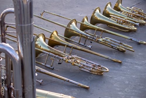Stack of Trombones, Baritones, Mellophone, and Tuba photo