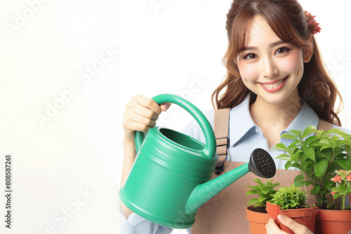 woman watering plants isolated on white background
