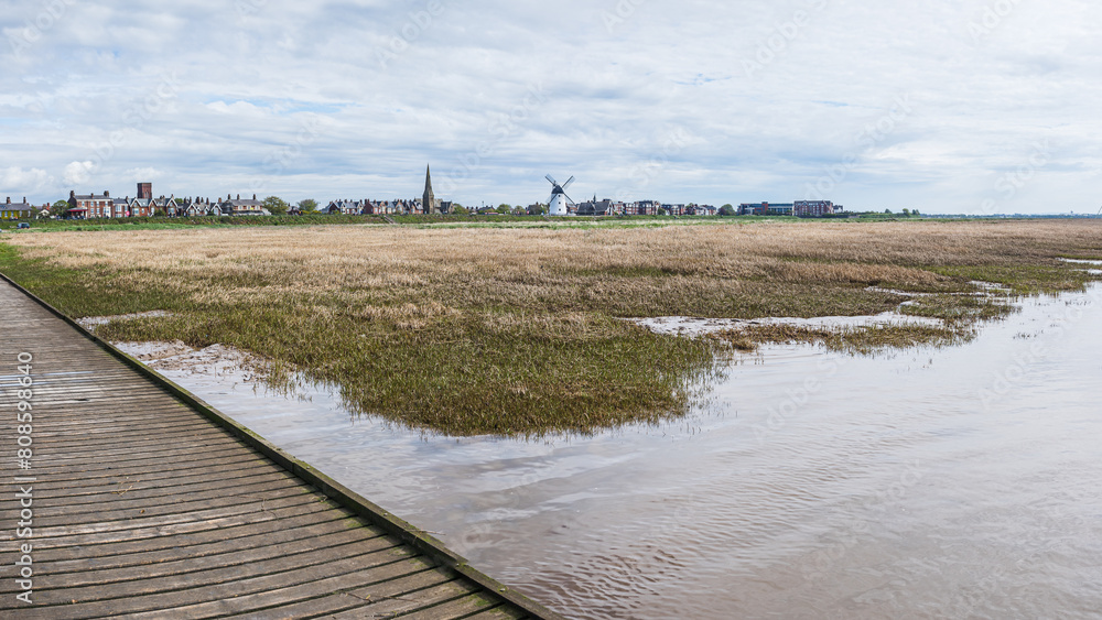 Fototapeta premium Lytham seafront over the jetty and marshes