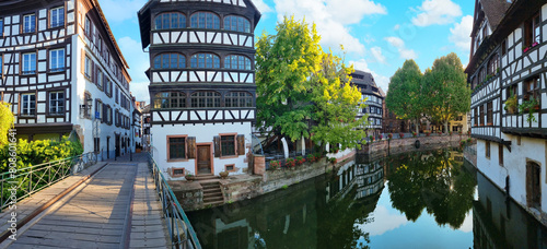 Le Petite France, the most picturesque district of old Strasbourg. Half-timbered houses with reflection in waters of the Ill channels.