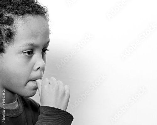 little boy sucking thumb on white background with people stock image stock photo photo