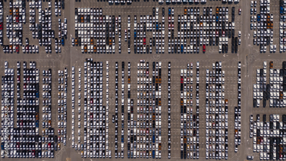 Top view of the electric vehicle transport yard and intercontinental shipping industry.. Top view of the electric vehicle transport yard and intercontinental shipping industry..