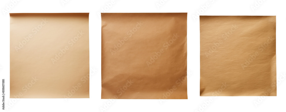 Three sheets of brown paper with torn edges on a black background. Three sheets of brown paper with torn edges on a black background.