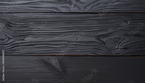 Black wood texture background coming from natural tree. Dark black Wooden panel with beautiful patterns. Space for work photo