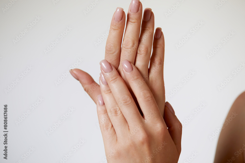 Beautiful Woman hand closeup. Manicure and Hands Spa. Manicured nails and Soft hands skin. Cosmetology, beauty. Skin care Beautiful Woman hand closeup. Manicure and Hands Spa. Manicured nails and Soft hands skin. Cosmetology, beauty. Skin care