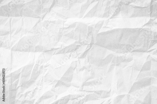 White recycled craft paper texture as background. Grey paper texture, Old vintage page or grunge vignette of old newspaper. Pattern rough art creased grunge letter. Hardboard with copy space for text.