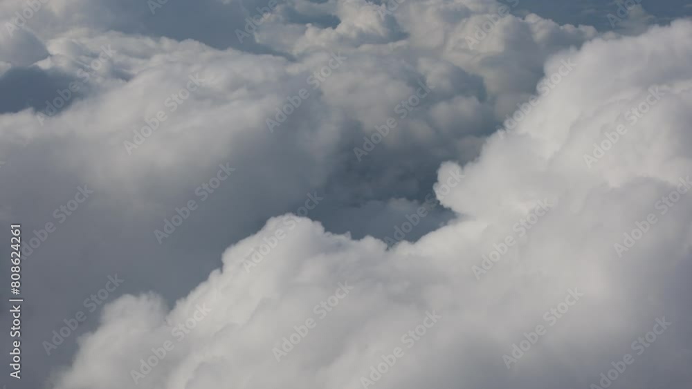 Air plane window view time lapse clouds and blue sunny sky, Loop of white clouds over blue sky with sun, Aerial view, 4K Air plane window view time lapse clouds and blue sunny sky, Loop of white clouds over blue sky with sun, Aerial view, 4K