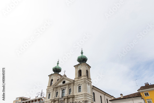 City of Gorizia, Piazza della Vittoria with the Church of Sant'Ignazio and the fountain. The beautiful streets and the castle behind them are a trace of history. Cultural Heritage Capital 2025.