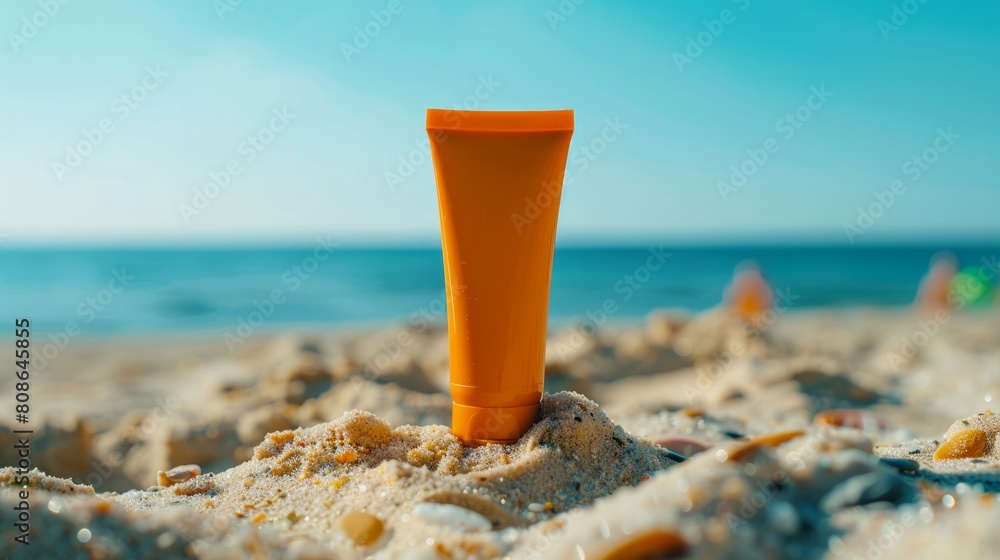 Sunscreen in orange cosmetic tube on summer vacation Sandy beach and sea background with sunscreen front view Summer vacation and UV protection cosmetic skin care concept. Sunscreen in orange cosmetic tube on summer vacation Sandy beach and sea background with sunscreen front view Summer vacation and UV protection cosmetic skin care concept.