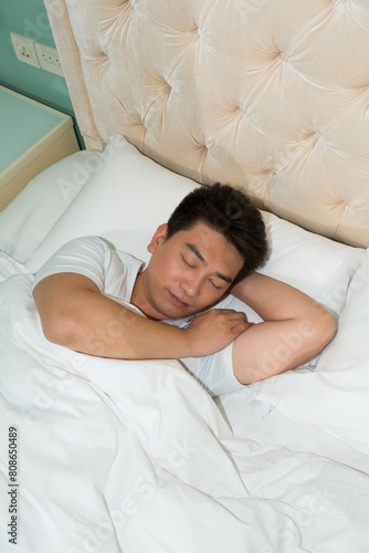 Middle-aged man to rest in the bedroom