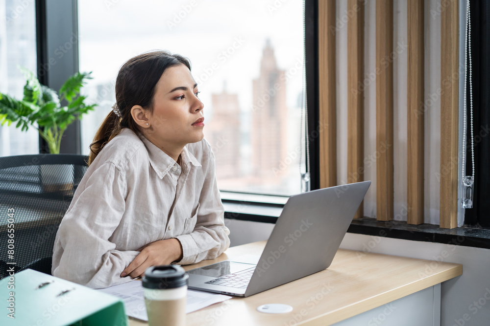Exhausted Asian young businesswoman overwork late in office workplace. Exhausted Asian young businesswoman overwork late in office workplace.