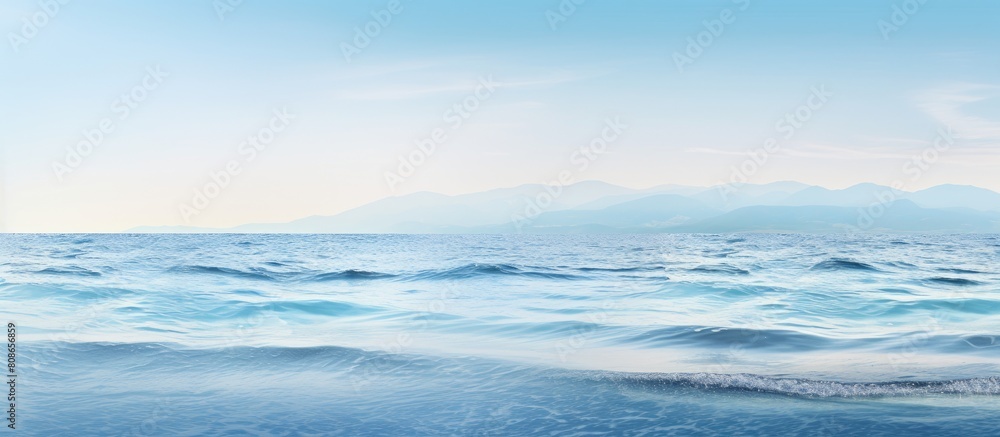 A serene seascape with gentle waves lapping at the water s edge offering a calming copy space image