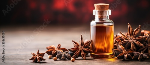 Aromatic essential oil with star anise in a bottle featuring copy space for easy customization photo