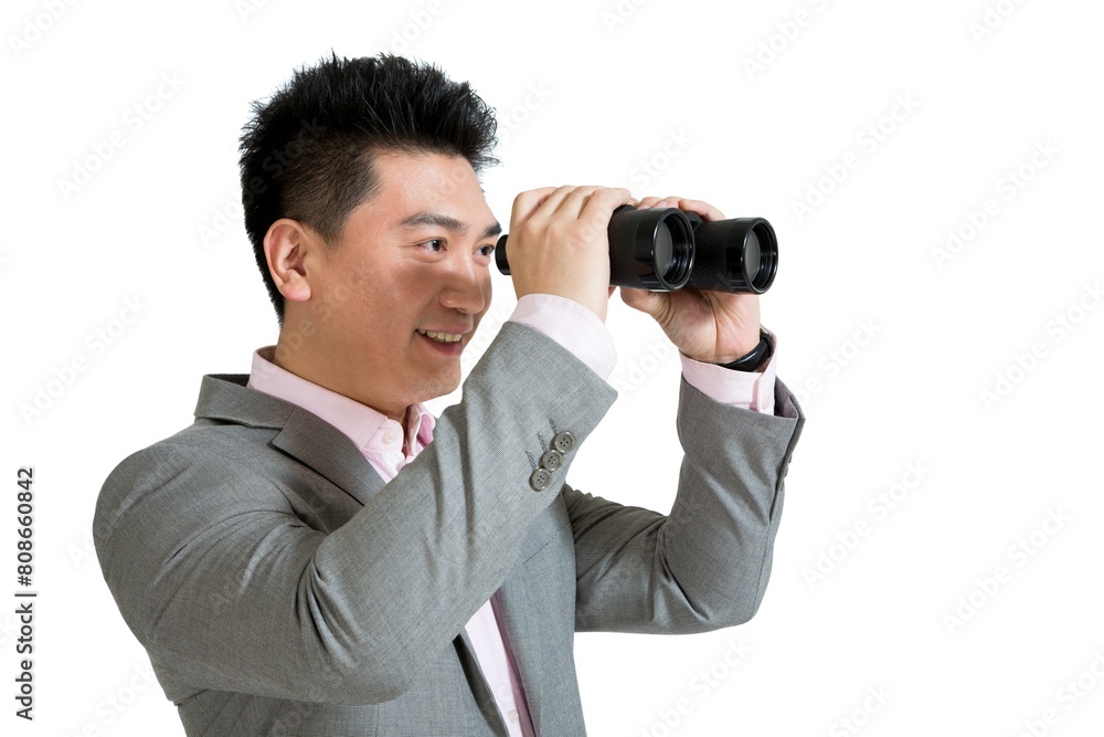 Shed middle-aged business man looking through a telescope Shed middle-aged business man looking through a telescope
