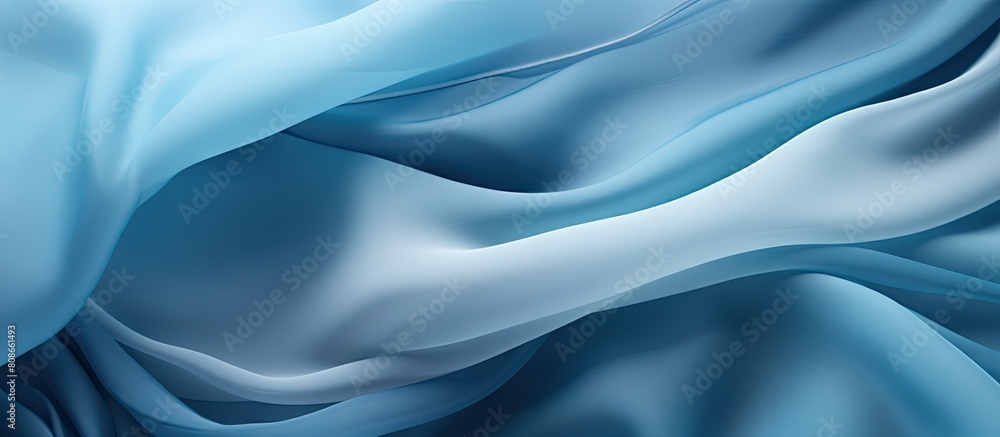 Fototapeta premium Close up image of a soft chiffon fabric with an abstract blue texture. Copy space image. Place for adding text and design