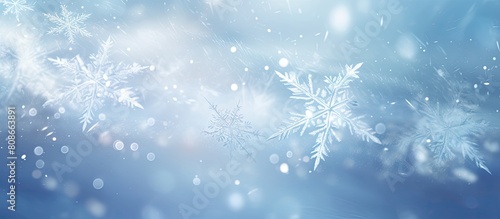 Snowflakes swirling in the gusty wind creating a mesmerizing copy space image