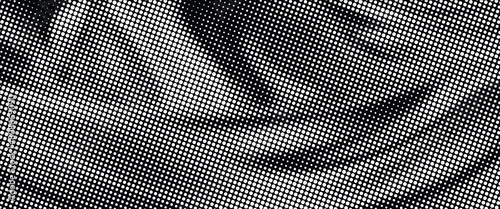 Halftone faded gradient texture. Grunge halftone grit background. White and black sand noise wallpaper