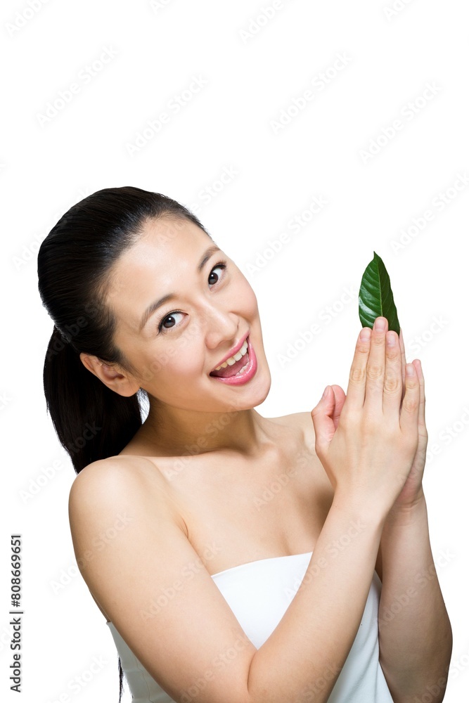 Shed on young women and green leaves