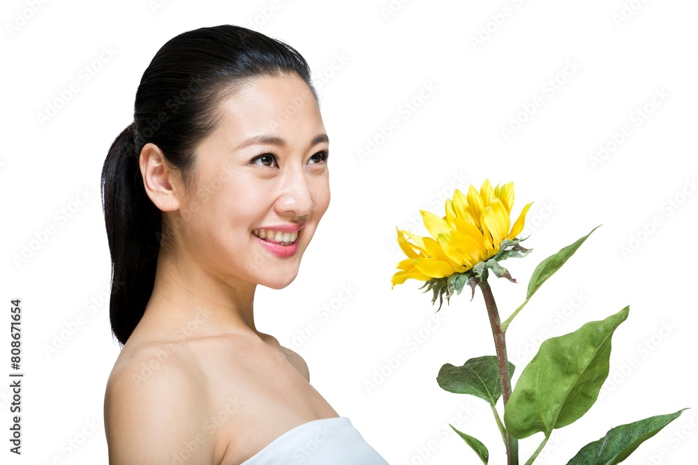 Shed on young women and sunflowers