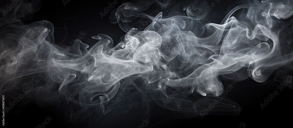 Copy space image of smoke cloud against a black backdrop