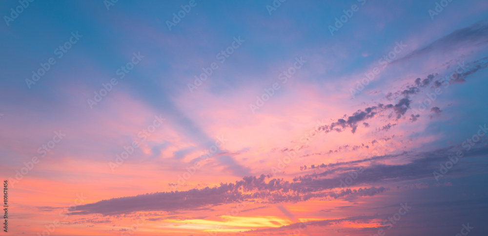Fototapeta premium Sunrise sky with clouds. Sunset Sky on Twilight in the Evening with Sunset. Cloud Nature Sky Backgrounds. Dusk clouds.